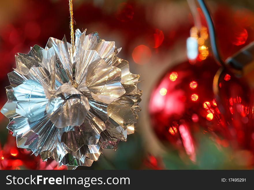 Closeup detail of Christmas decoration on tree with light