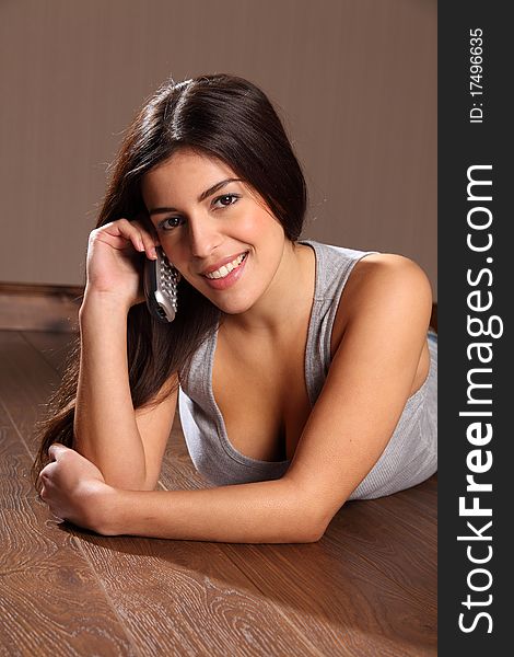 Beautiful Young Woman Speaking Using Telephone