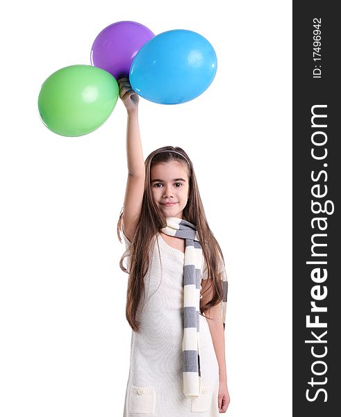 Little smiling girl with balloons