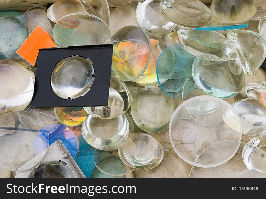 Inside a box of glass lenses