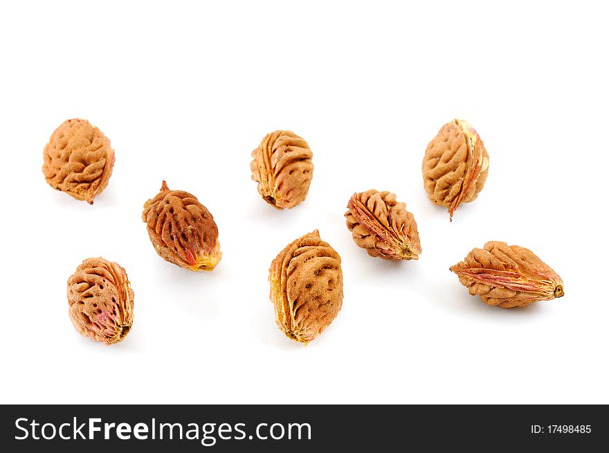 Peach stones isolated on white background. Peach stones isolated on white background.