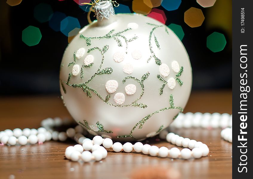 Christmas ball tree decoration with pearls and colorful background. Christmas ball tree decoration with pearls and colorful background