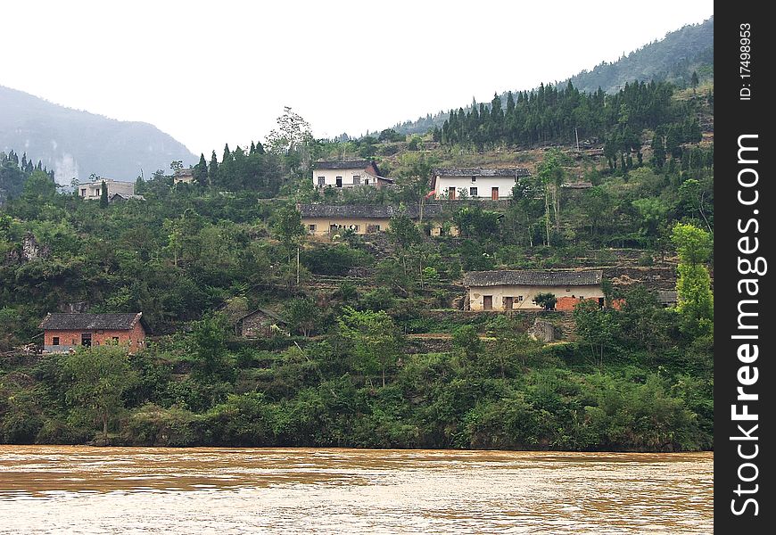 Rural Homes Along The River Bank