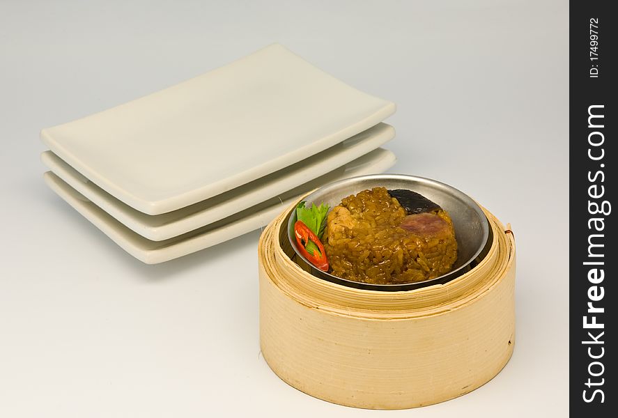 Chinese steamed rice dimsum in bamboo containers traditional cuisine. Chinese steamed rice dimsum in bamboo containers traditional cuisine