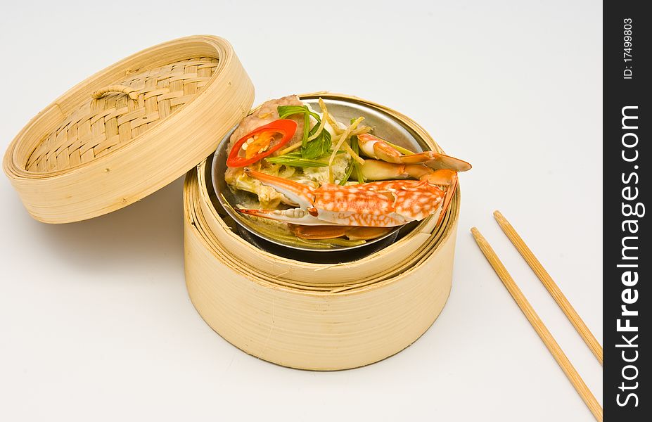 Chinese steamed crab dimsum in bamboo containers traditional cuisine. Chinese steamed crab dimsum in bamboo containers traditional cuisine