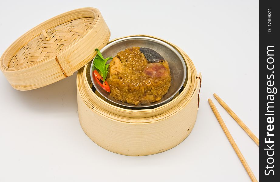 Chinese streamed rice dimsum in bamboo containers traditional cuisine. Chinese streamed rice dimsum in bamboo containers traditional cuisine