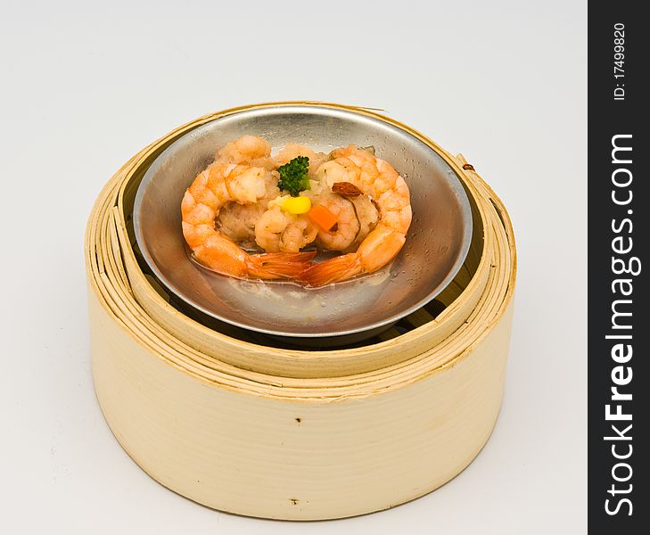 Chinese streamed shrimp dimsum in bamboo containers traditional cuisine. Chinese streamed shrimp dimsum in bamboo containers traditional cuisine