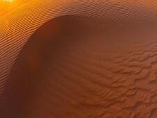 Waves Of Sand Texture, Dunes Of The Desert. Royalty Free Stock Photos