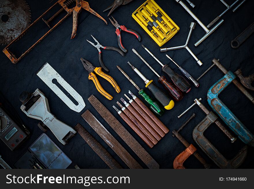 Photo top view a huge set collection of working hand and power tools many for the wooden on isolated black background, Toolset with interior,  do-it-yourself  DIY tool, kit flat style, Stock hardware