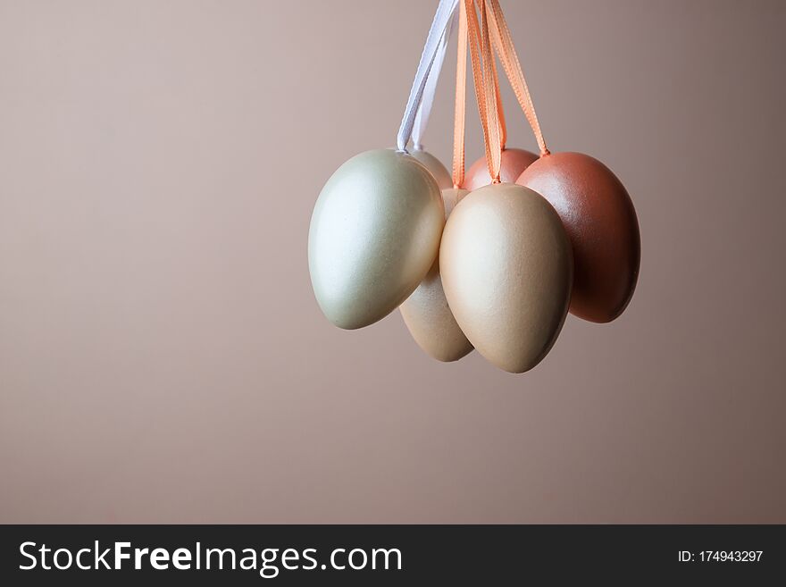 Decorated Pearl Easter Eggs On A Pink Background. Minimal Holiday Concept. Happy Easter Background. A Place For Text