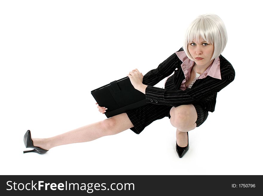 Beautiful young modern business woman with leather portfolio over white.  Capri business suit and diamond studded tie. Beautiful young modern business woman with leather portfolio over white.  Capri business suit and diamond studded tie.