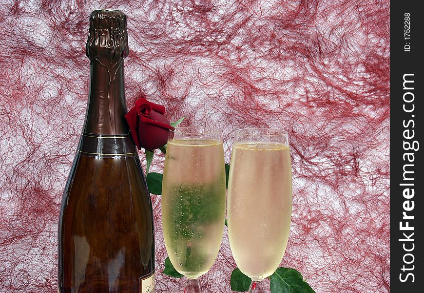 Champagne bottle and two cups for celebrate san valentine`s day