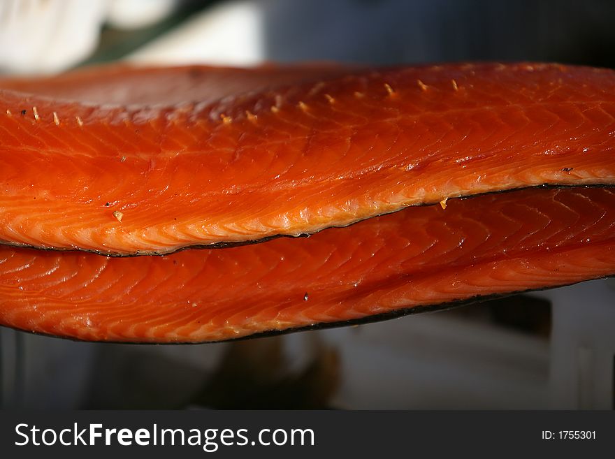 Fillet of a red smoked fish. Fillet of a red smoked fish