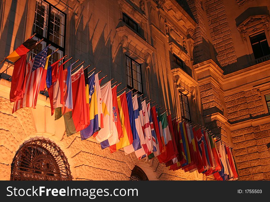 Flags of different countries in the night