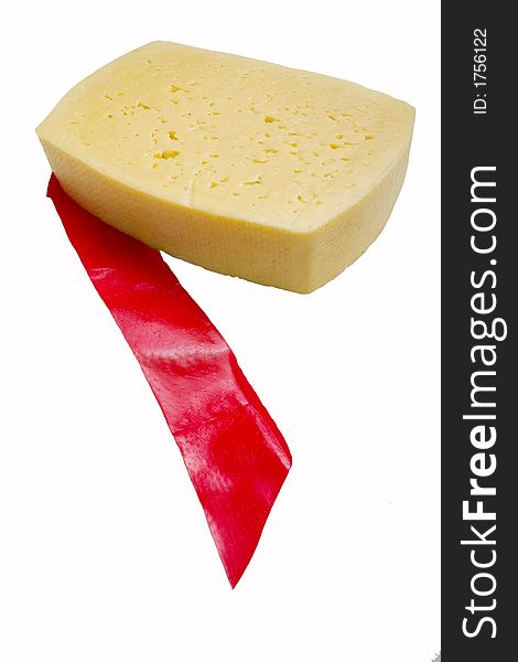 Piece of cheese with the part of red cover