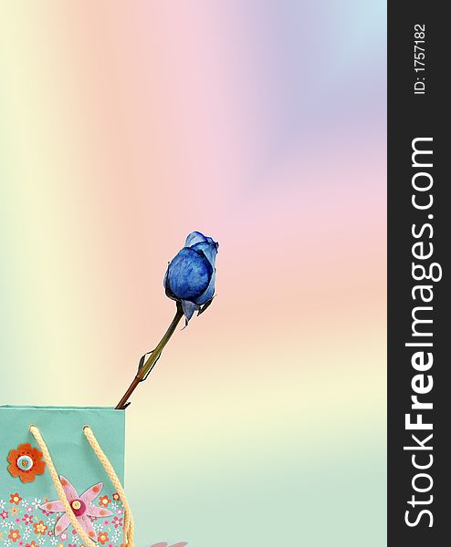 Flower bag with blue rose on rainbow gradient background with copy space