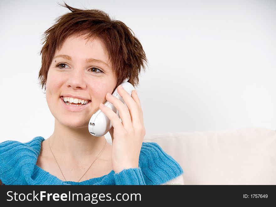 Lovely woman smiling which chatting on the phone. Lovely woman smiling which chatting on the phone