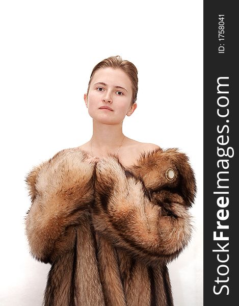 Woman in fur of racoon