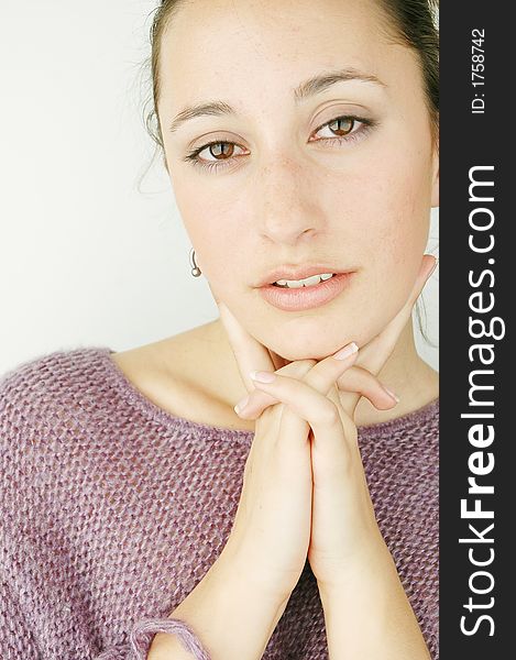 Beautiful girl portrait deeply in thinking against white background. Beautiful girl portrait deeply in thinking against white background