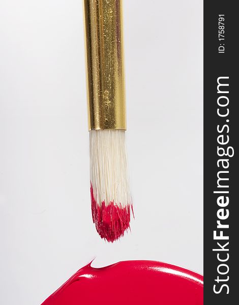 Paint brush close up with red color. Paint brush close up with red color