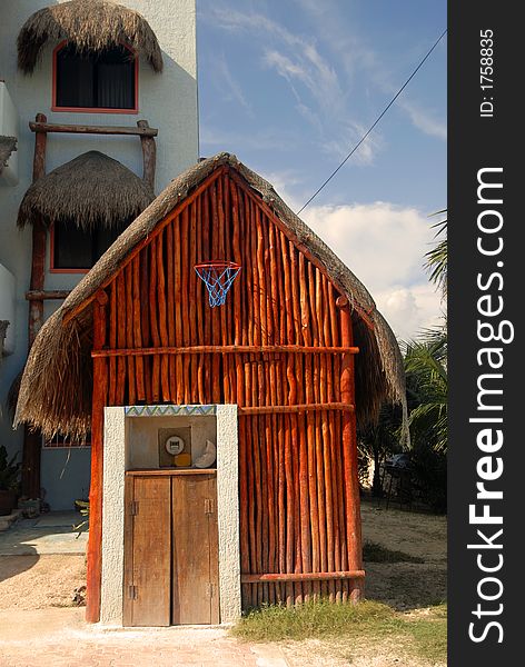 Basketball hoop on little shed in mexico. Basketball hoop on little shed in mexico