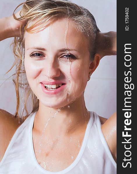 Young woman taking a shower. Young woman taking a shower