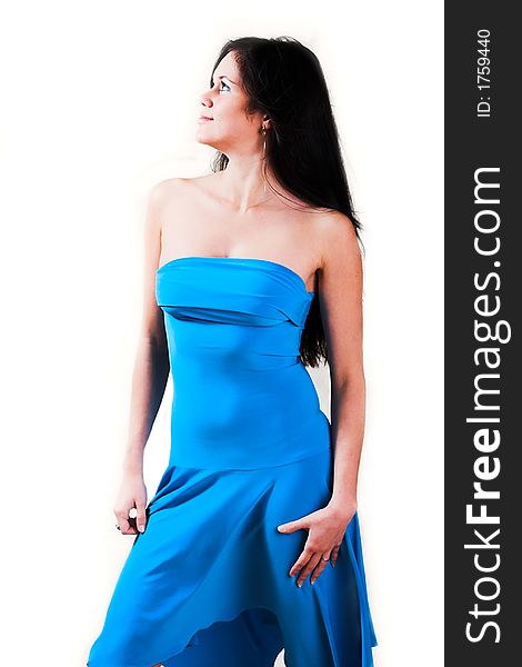 Young beautiful sexy woman in blue dress