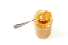 Honey In The Jar With Spoon Stock Photography