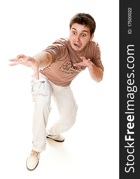 Attractive young casual guy playing the fool
