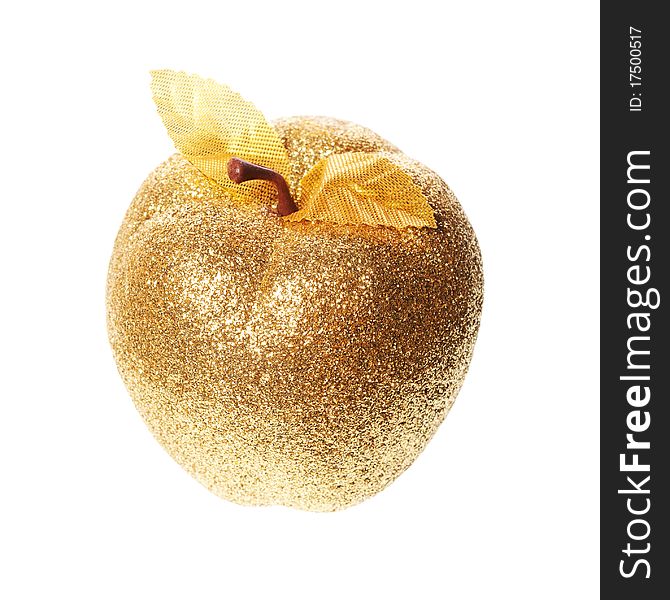 Golden apple lying on a white background