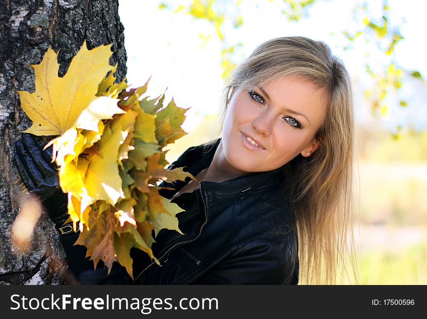 Young beautiful woman with the nature, autumn. Young beautiful woman with the nature, autumn.