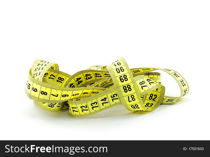 Close-up of a measuring tape against a white background