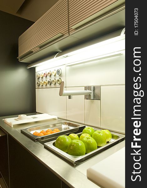 Part of kitchen with fruits