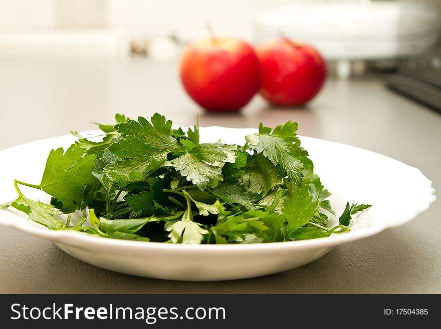 Freshly chopped parsley on a white plate