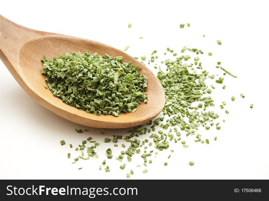 Cut chives and onto wooden spoons. Cut chives and onto wooden spoons