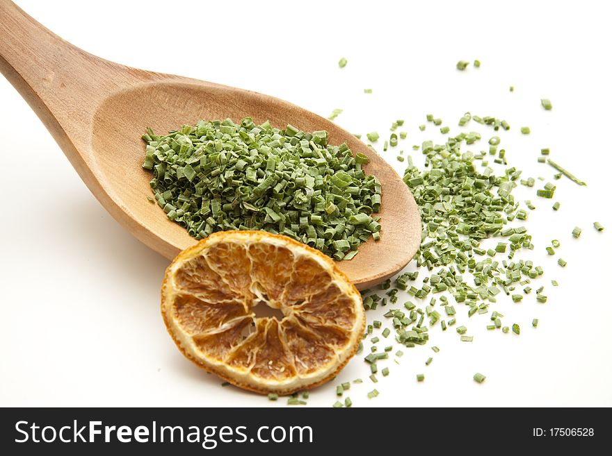 Cut chives and onto wooden spoons with lemon. Cut chives and onto wooden spoons with lemon