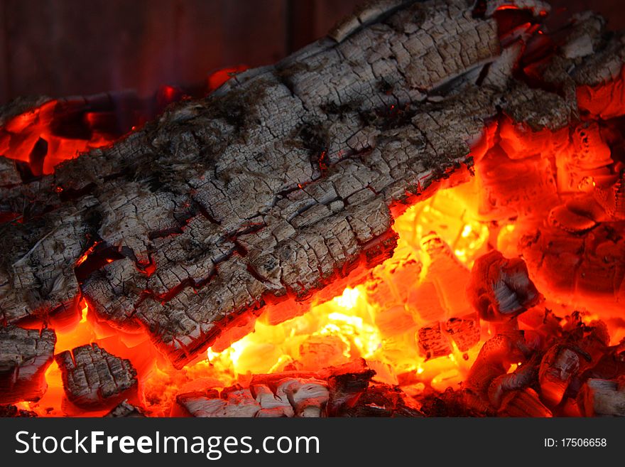 Embers in fireplace to warm up in cold winter. Embers in fireplace to warm up in cold winter