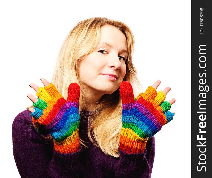 Beauty young woman blonde in colorful gloves. Beauty young woman blonde in colorful gloves