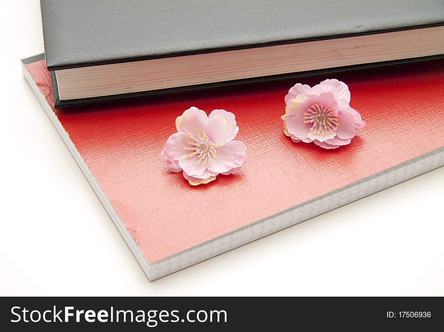 Black and red address book with blossoms