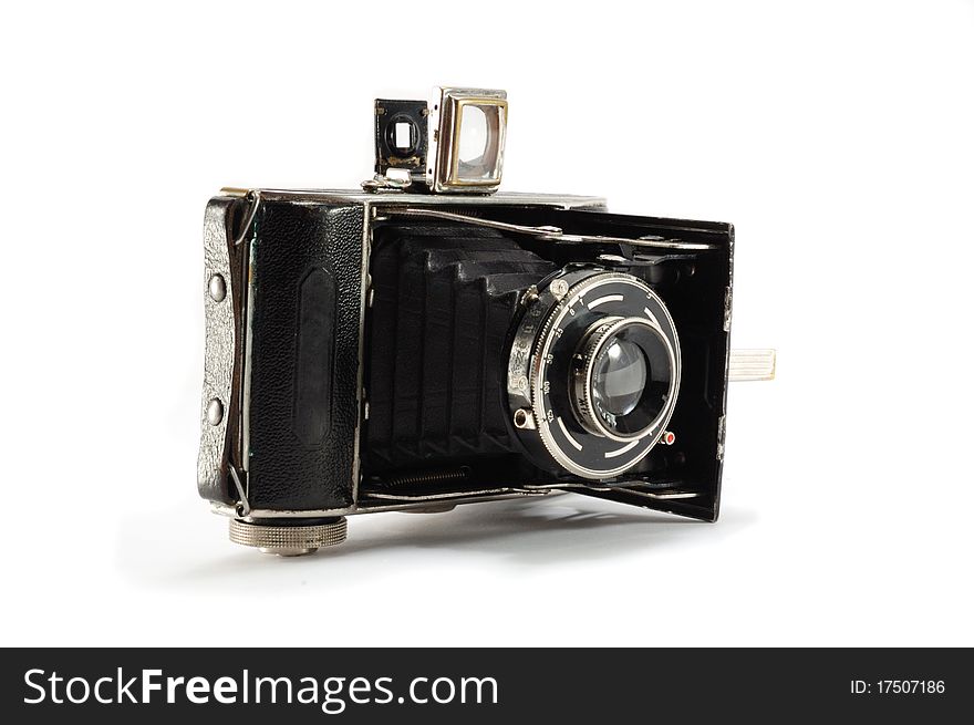 Old film photo camera on white background, isolated