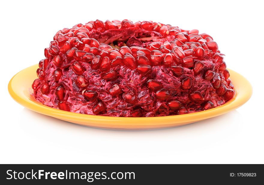 Fruit cake with pomegranate seeds isolated on white background