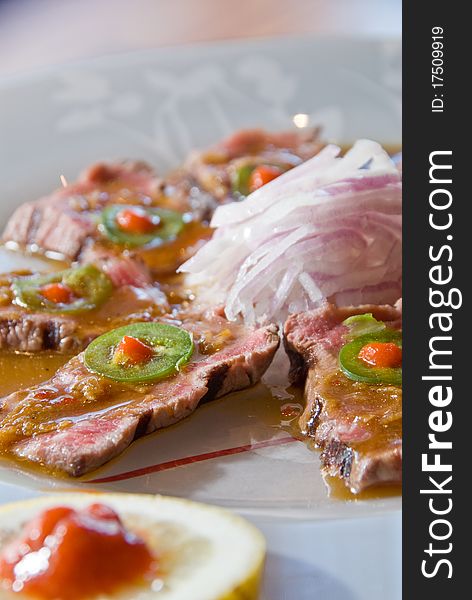 Seared beef tataki with jalapenos and pimento