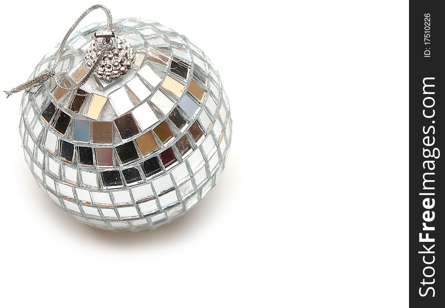 Closeup of a mirrorball on a white background