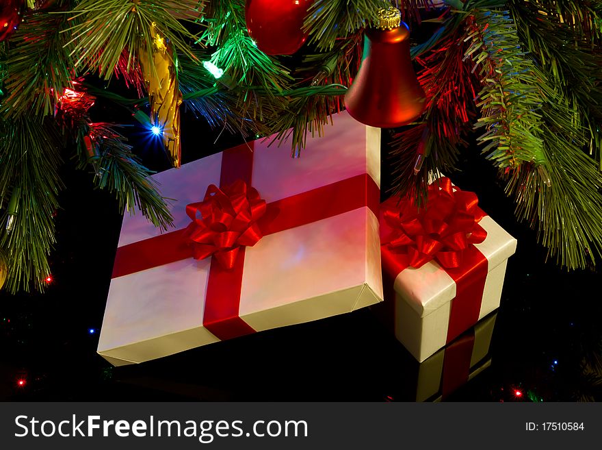 Gifts and christmas tree with lights