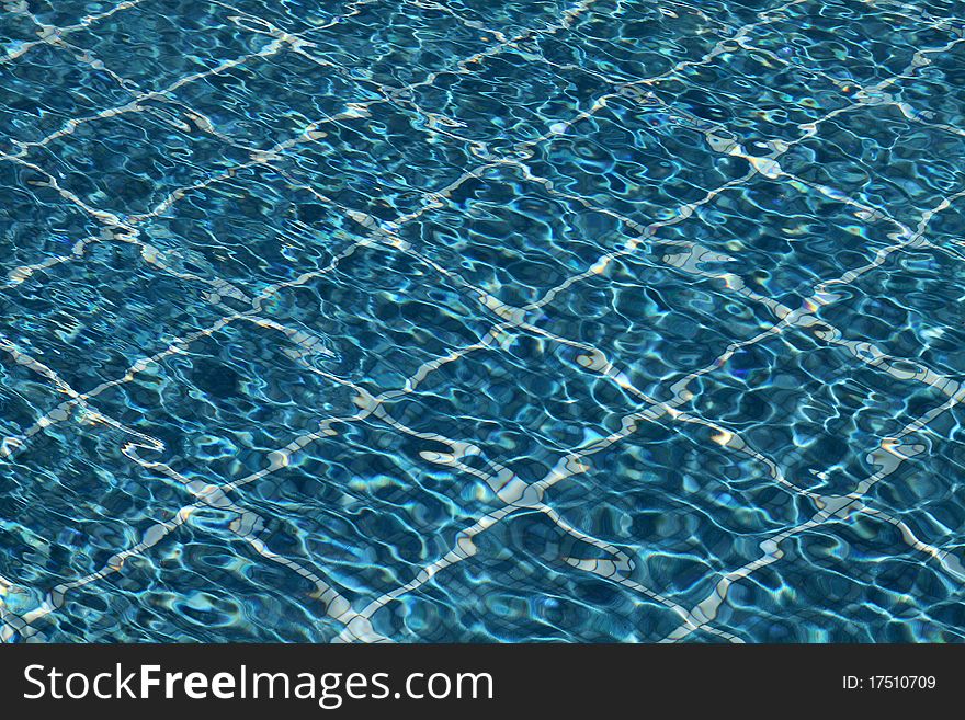 Waves in a blue swimming pool. Waves in a blue swimming pool