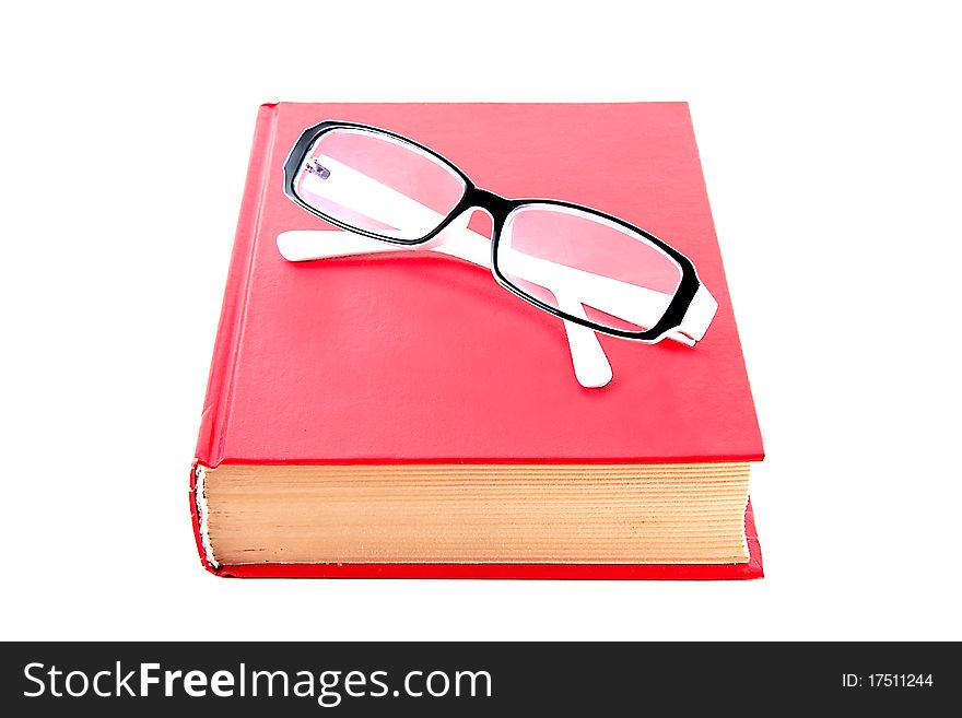 Book with glasses isolated on white background. Book with glasses isolated on white background