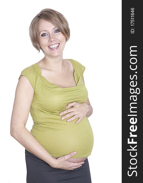 Pregnant pretty woman in studio over white background. Pregnant pretty woman in studio over white background