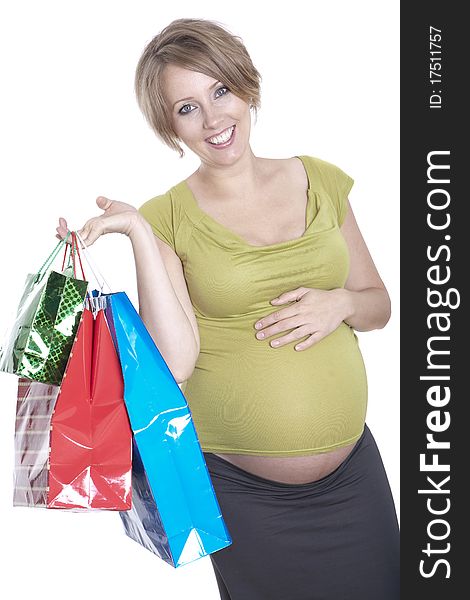 Young pregnant woman shopping while expecting baby