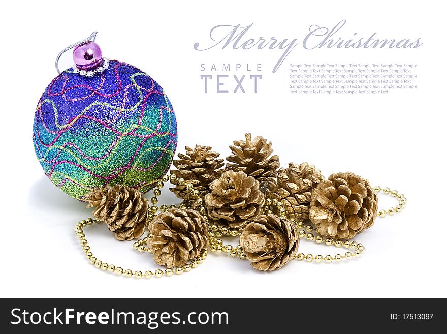 Isolated shiny pink Christmas ball and gold Spruce branches with copy space. Isolated shiny pink Christmas ball and gold Spruce branches with copy space