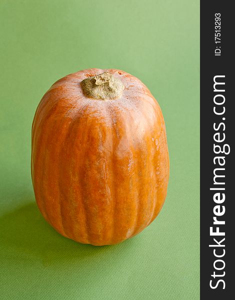 Pumpkin in isolated on green background